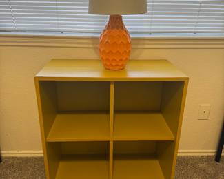 bookshelf/table, lamp