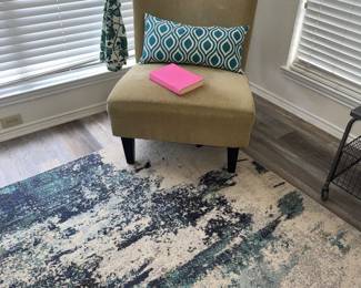Accent chair, pillow, rug