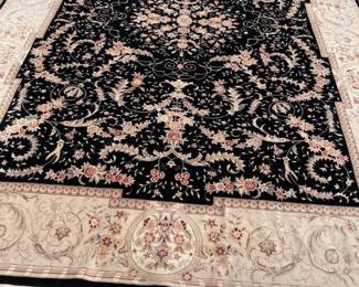 Wool rug is 13' x 15'