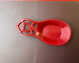 Red cast iron spoon holder