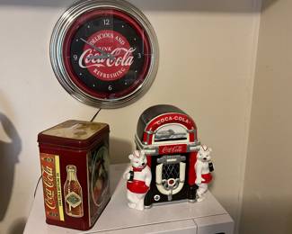 Always Friends cookie jar, neon clock, red lady tin.