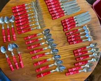 Flatware with red Coca Cola handles