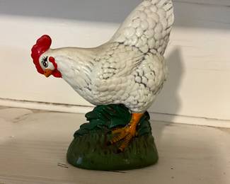 Look at the eyelashes on this pretty little ceramic hen. 