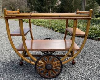 This photo is of the same bar cart in the sale without the two small side shelves. They are not missing. The cart was manufactured with and without the shelves.