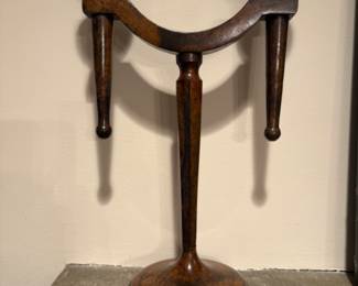 Heavy metal (patinated iron? bronze?) candleholder