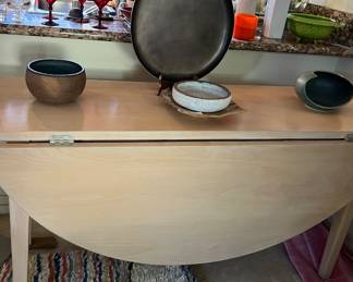 Drop leaf table and studio ceramics. You will find more studio ceramics many decorative accessories 