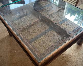 East Indian door converted to a glass top coffee table! 