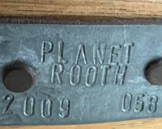 The label on the back of the wine barrel chair from a limited edition collection. Patent #D615313 