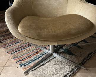 Pair of Melville swivel chairs with four star bases 