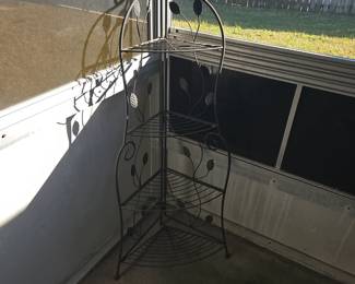 We have two of these folding metal plant shelves $20 each