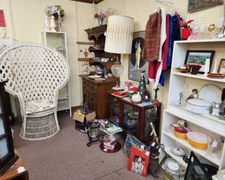 Wicker Peacock chair, maple cupboard with hutch, display cabinet