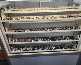 Large selection of enamel pins, many popular subjects