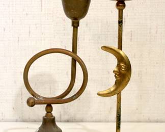 vintage brass French horn candlestick, 11"
A brass crescent moon candle holder, 11"
These items can be shipped.