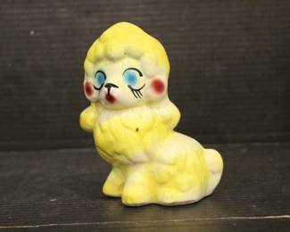 Vintage Ceramic Poodle Figurine: Hand-Painted Dog Collectible 6" x 4", in a lot with, vintage 1950s Norleans Cocker Spaniel Ceramic Green Woven Handled Basket Coin Bank, 6" x 5", Vintage Redware French black poodle Bookend Pen Holder 7" x 3" x 2",  hand-painted ceramic fortune cookie-shaped trinket 2" x 1". These items can be shipped.