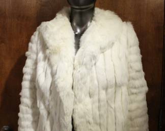 A vintage rabbit fur coat Womens size S, some staining on lining and front fur as pictured. This item can be shipped.