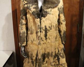 A vintage full-length rabbit fur coat in tan and brown with a large collar Womens size S, excellent condition, made in Hong Kong. This item can be shipped.