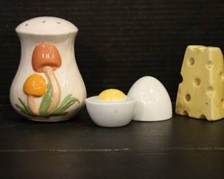 Vintage Ceramic Arnels Mushroom shaker 5" tall, 
Vintage Avon egg shakers, 3" tall together,
Cheese shaker 3" tall,
These items can be shipped.