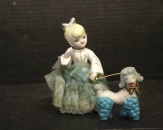 Vintage Tall Porcelain Girl In Lace Dress W/Blue Poodle On A Silver Leash, 5", in a lot with, a vintage Japanese porcelain figurine of a woman in a bonnet holding a basket, 4", 
vintage ceramic Geo Z. Lefton "Twin Figure" girl with a matching doll figurine, 4"
Vintage Christmas Angel Playing Harp ART Plastics British Hong Kong, 5" 
These items can be shipped.