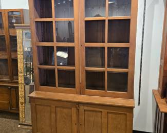 Early 2 piece solid cherry bookcase. 16 panels.