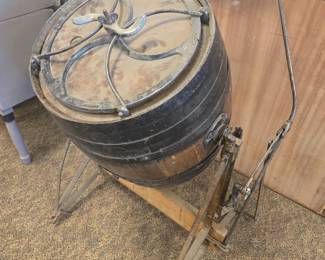 Early barrel churn with handle to spin.