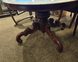 Modern mahogany French style table w/marble top.