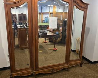 Louis XV triple door French Walnut armoire.