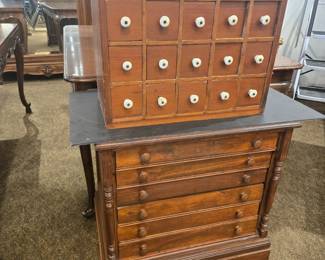 Top pine 20 drawer spice cabinet. bottom 6 drawer spool cabinet.