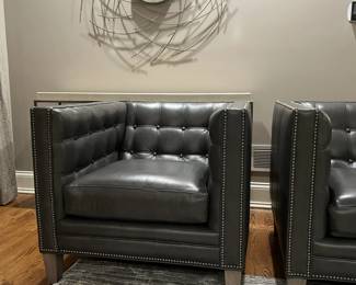Leather lounge chairs - available for Presale. Contact Patty at 847-772-0404 for more information.