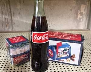 Vintage Coca-Cola 1990s Collectible Lot with Mini Mailbox Tin, Candle, and Glass Bottle