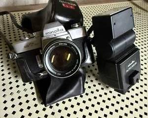 Vintage Minolta SRT 101 35mm Film Camera with Minolta Auto 320Z Flash