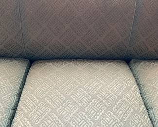 Close-up of green fabric on the vintage three seat sofa (Note: this sofa has been covered with a slip-cover for years. The fabric is in very good condition)