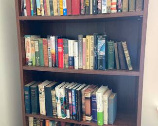 Bookcase for sale and books of every age and genre! The homeowner was an avid book collector his entire 99 year life!