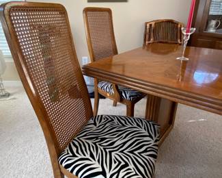 Pecan dining table and six chairs-two Captain’s chairs and four side chairs