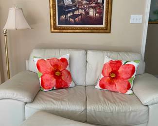 Love seat and ottoman and matching sofa, sold separately 