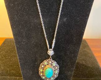 Marked “Germany” on the back of the necklace and in each clip-on earring. Beautiful vintage blue & green color!