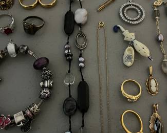 Nice selection of sterling silver jewelry, costume jewelry, and a few gold rings, chains and pendants.