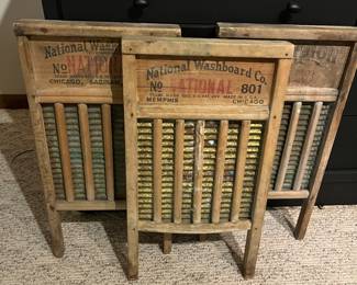 Three antique National Washboard Co. washboards.