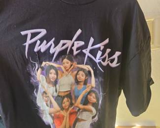 Lots of k-pop shirts posters and more