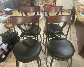 4 Bar Stools.  From the seat to floor is 2' and 41" tall top to bottom