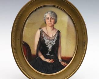 Rudolf Sternad, German, 1880-1944.  A 1930's miniature painted portrait of a woman.  Depicted three-quarter length, seated wearing a Black flapper style dress and diamond jewelry.  Signed "Rud. Sternad" and dated "1930" lower center, frame marked "Made in Austria".  Minor wear.  Image 6 x 4 3/4" high, in a cast metal frame with gold finish and some wear to patina, 6 1/2 x 8" high overall.   NOTE: From the estate of Bill & Barbara Shulhof of Saginaw, Michigan.