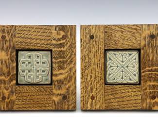 Two contemporary framed Motawi Art Tiles.  Square tiles with molded Celtic Knot and Perth designs with Green/Grey glaze.  Presented in Quarter Sawn White Oak frames by Michael Miller Studios with optional easel.  Dated "2010" at back.  Unused, good condition.  Tiles each 2 3/4 x 2 3/4" high, frames 7 x 7" high overall.  