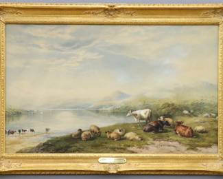 Thomas Francis, Wainewright, British, 1794-1883.  A watercolor on paper depicting sheep and cattle relaxing by a lake amidst the mountains.  Titled and signed "Cattle by T.F. Wainewright" lower right.  Paper is toned.  Image 26 1/8 x 15 3/4" high, in a newer Gilt wood frame with light wear, 31 1/4 x 21" high overall.  