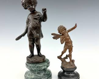 Two early to mid 20th century Bronze figures.  Includes an Allegorical depiction of an Autumn Putto presented on a shaped Verde Marble plinth after Clodion (Claude Michel), and a figure of a Nymph presented on a Black Marble plinth.  Both unsigned.  Each with minor wear to patina, Putto lacks object in one hand, Nymph's bolt at foot loose.  Up to 10 1/2" high.  NOTE: From the estate of Bill & Barbara Shulhof of Saginaw, Michigan.