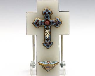 An early 20th century French Onyx and Champleve Holy Water font.  Shaped Onyx cross with applied Champleve Brass cross and hinged font.  Onyx with edge flakes, minor losses to enamel.  5 3/4" high.   NOTE: From the estate of Bill & Barbara Shulhof of Saginaw, Michigan.