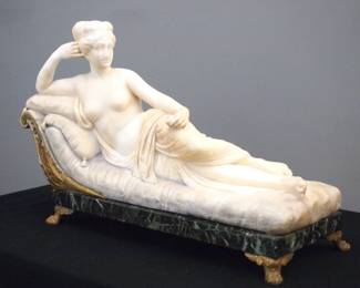 An early 20th century carved Alabaster figure of Paolina Borghese Bonaparte depicted as Venus Victrix, after Antonio Canova.  Depicts the semi nude Princess posed reclining on an elegant "Agrippina", a type of Empire-style chaise on a Verde marble base with gilded Bronze mounts.  Incised signature "Canova G.P.  ".  Some surface discoloration, chip in one toe.  24 x 8 1/2 x 15" high overall. 