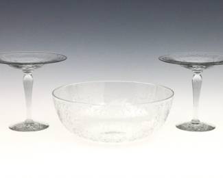 Three pieces of early to mid 20th century etched Crystal tableware.  Includes a pair of Libbey compotes and a Baccarat "Michaelangelo" bowl with etched floral decoration.  Marked "Baccarat France" and "Libbey" at undersides.  Minor surface wear, some fleabites.  Up to 10" diameter and 6" high.  