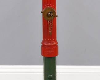 A late 19th century Eclipse Fire Hydrant.  Cast Iron construction with a dome top and Bronze fittings, marked "Eclipse, Pat. July 20th, 1886".  Re-painted Red/Green finish, includes an iron display base.  36 1/2" high overall.  