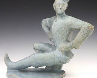 An early 20th century Alexis Lapteff for Pewabic Pottery figure.  Depicts a man folk dancing in a prysiadka stance with a mottled Blue glaze.  Unsigned.  Minor wear, crazing.  11 1/2 x 9 1/2" high. 