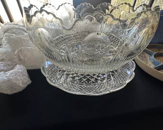 Old pressed glass punch bowls with a lot of cups 
Probably anchor hocking or imperial glass