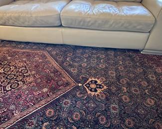 Italian leather couch and chair 
Excellent condition and modern 
Antique rug 